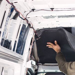 man working on camper van conversion